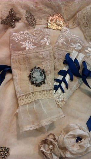 Victorian inspired lace and cameo arm cuffs with blue ribbons